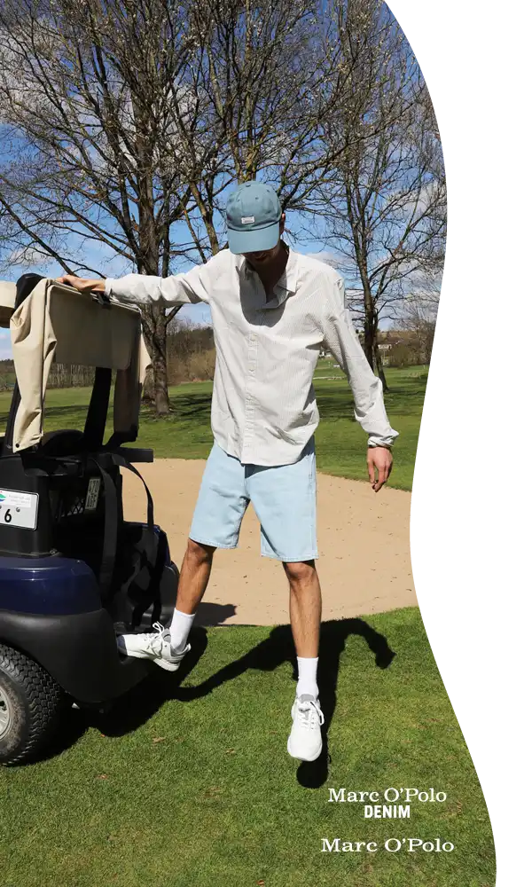Sportliches Outfit mit roten und blauen Akzenten 