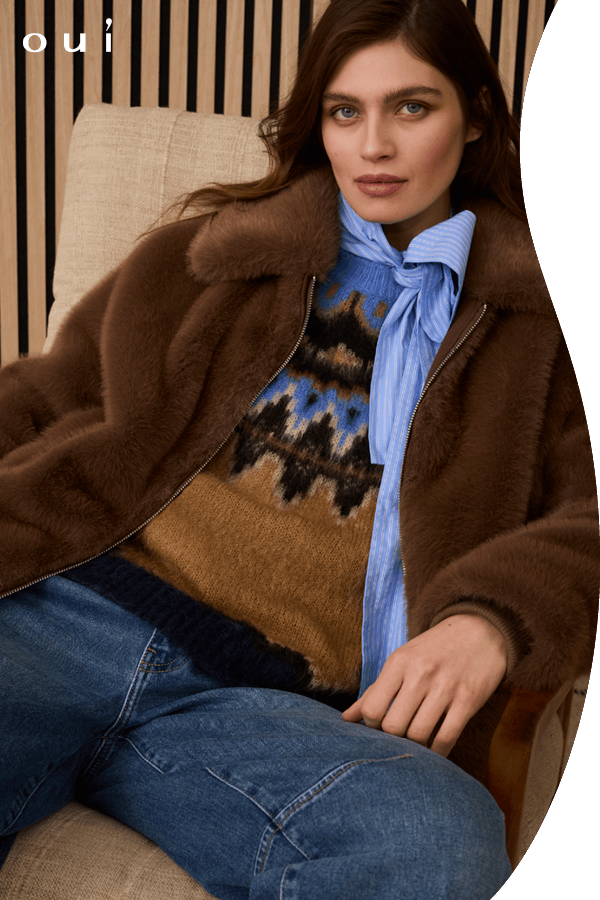 Flausch-Jacke mit hellblauer Bluse und einem New Country Pullover